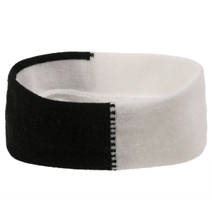 Close-up of black and white striped knitted headband with elastic texture and clean seams
