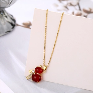 18k gold plated titanium steel necklace featuring a red agate gourd pendant with diamonds