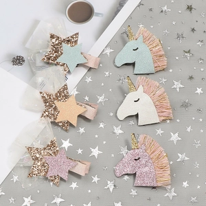 Unicorn hair clips set with glitter stars and colorful tassels for children party