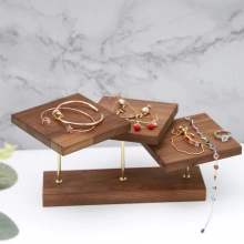 Three-tier walnut wood and gold metal jewelry display stand for necklaces and rings