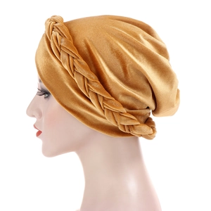 Golden velvet turban hat for women featuring a stylish braided knot design in front