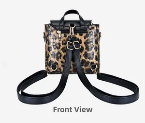 Front view of leopard print backpack with crocodile embossed leather and gold hardware