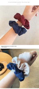 Detailed texture of retro corduroy hair scrunchies in various vintage autumn colors