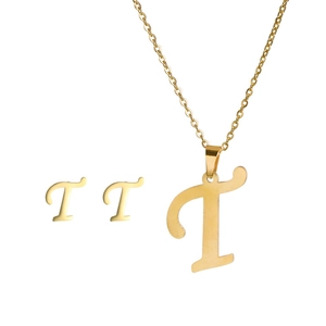 Polished gold stainless steel jewelry set featuring cursive letter T necklace and earrings
