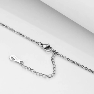 Detail view of 18KGP silver necklace lobster clasp and adjustable extension chain