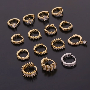 Variety set of 14 gold and silver huggie earrings with sparkling cubic zirconia stones