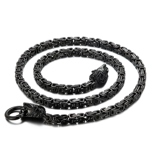 Men's black Byzantine chain necklace with detailed double wolf head charms and circular ring