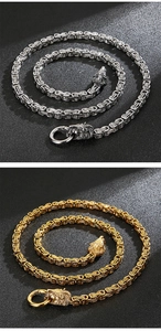 Detailed comparison of gold and silver Byzantine chains with lion head clasp for men