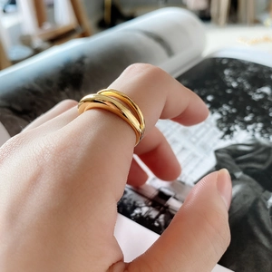 Minimalist double-layered gold sterling silver ring with a polished glossy finish