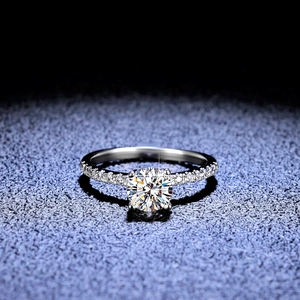 Classic 1 carat moissanite silver ring with four-prong setting and side accent stones