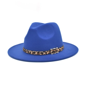 Detail of royal blue wool fedora hat with leopard print belt and golden metal buckle