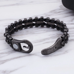 Mens woven black leather punk bracelet with silver skull magnetic stainless steel clasp