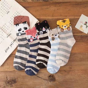 Detail of five pairs of cotton crew socks featuring cute cartoon animal ears and stripes