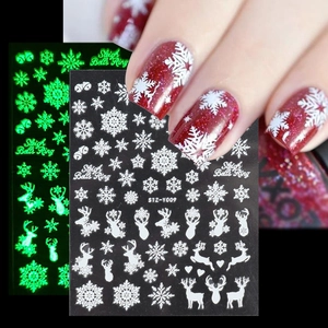Luminous Christmas nail art stickers featuring white snowflake and elk patterns