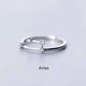 Minimalist silver Aries constellation ring with zircon stones in an adjustable design