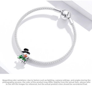 Detail of S925 silver snowman charm with Forever Love engraving on the mesh bracelet