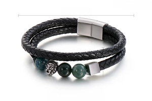 Detail view of double-layer leather bracelet with silver lion head and magnetic steel clasp