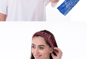 Detail of blue and burgundy paisley pattern wide headbands worn by a model
