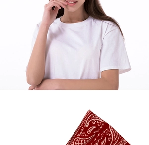 Detail of red paisley print headband fabric paired with a casual white cotton T-shirt