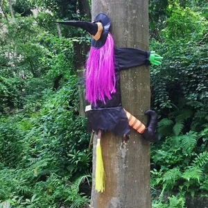 Halloween crashing witch outdoor tree decoration with purple hair and striped legs