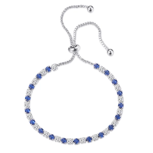 Adjustable blue and white cubic zirconia tennis bracelet with a polished silver finish