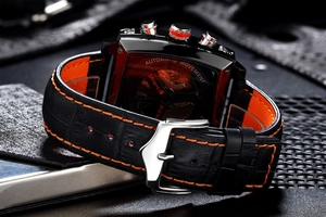 Square automatic mechanical watch with black leather strap and orange stitching details