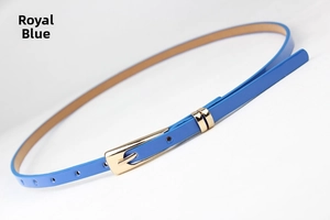 Detail of royal blue skinny belt with glossy finish and gold-tone pin buckle
