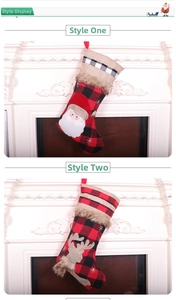 Detail of red and black buffalo plaid Christmas stockings with reindeer and santa applique