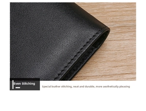 Close-up of premium black pebble grain leather wallet with uniform stitching and rfid texture