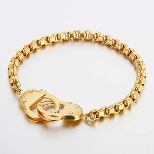 Golden stainless steel handcuff clasp bracelet with bold round link chain design