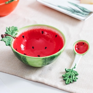 Vibrant watermelon-shaped ceramic bowl and spoon set for creative kitchen dining