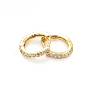 Detail of gold hoop earrings with micro-pave white cubic zirconia stones on white background