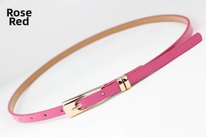 Detail of rose red fashion slim belt with golden pin buckle and double belt loops