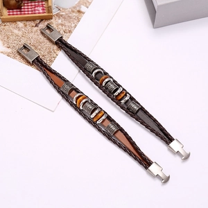 Detail of multilayer leather bracelet with tiger eye beads and metal magnetic clasp