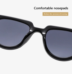 Close-up of comfortable integrated nosepads on black sunglasses reducing wearing pressure