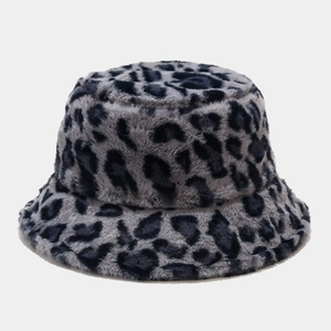 Close-up of thick plush leopard pattern bucket hat with soft faux fur texture for winter