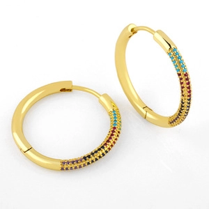 Detail of gold-plated hoop earrings featuring multi-color cubic zirconia stones