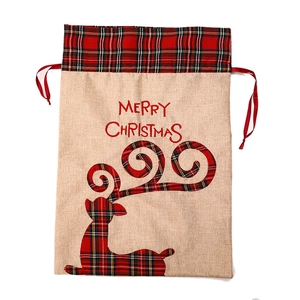 Linen Christmas gift bag with red buffalo plaid trim and Merry Christmas embroidery