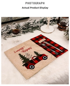 Linen Christmas placemat with red truck print and buffalo plaid cutlery pocket detail