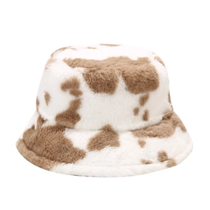 Plush faux fur bucket hat with brown and white cow print pattern for autumn winter