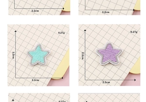 Detail view of colorful star embroidery patches in mint and purple with size dimensions