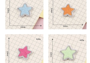 Detail showing embroidered star patches in four colors with 2.2cm size measurements