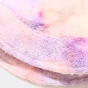 Vue macro de la texture du tissu peluche arc-en-ciel rose, violet et orange