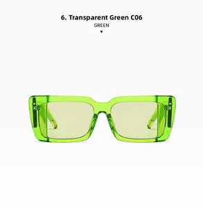 Close-up of transparent neon green oversized rectangle sunglasses frame in C06 style