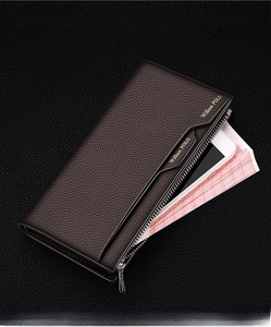 Detailed view of dark brown leather wallet with large capacity for phone and cash