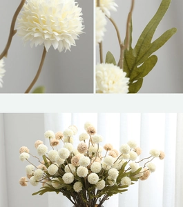 Close-up of artificial cream dandelion bouquet with detailed petals and green foliage