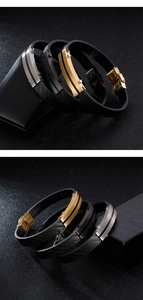 Detailed macro of men's leather bracelets showing carbon fiber texture and metal clasps