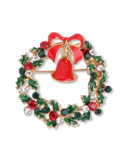 Detail showing a Christmas wreath brooch with red enamel bow and colorful rhinestones