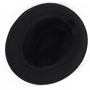 Detail shot of the black fedora hat interior showing the fabric blend label and sweatband