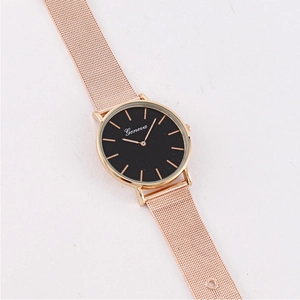 Minimalist men's quartz watch with black dial and rose gold Milanese mesh strap